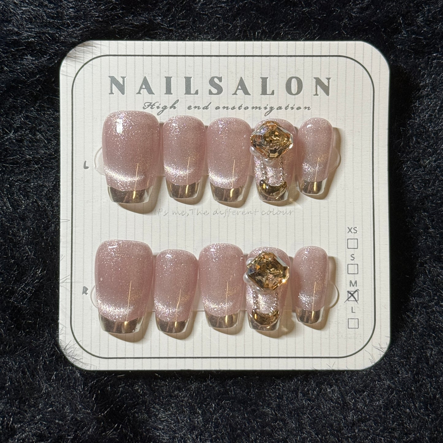 press-on nails / pink cat-eye with French golden tip and stones