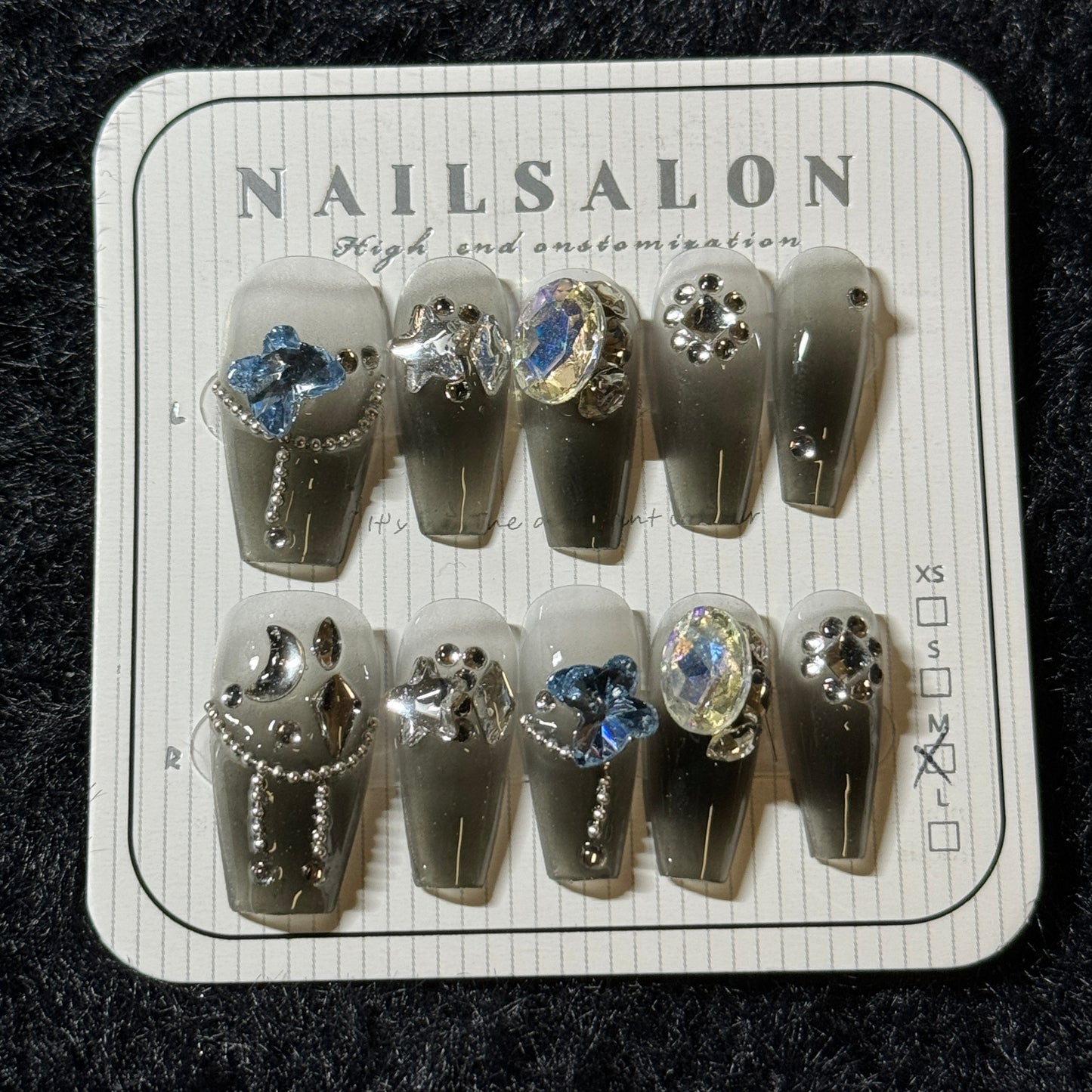 press-on nails / grey or black gradient with blue stones and chains