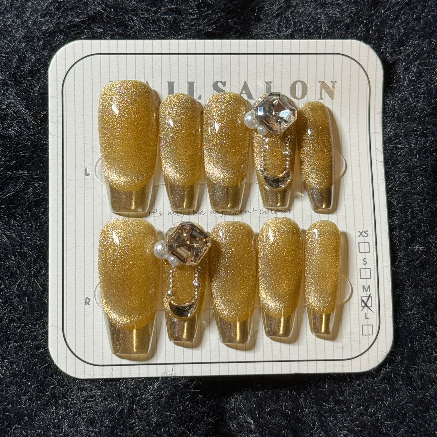 press-on nails / yellow golden cat-eye with French tip and stones