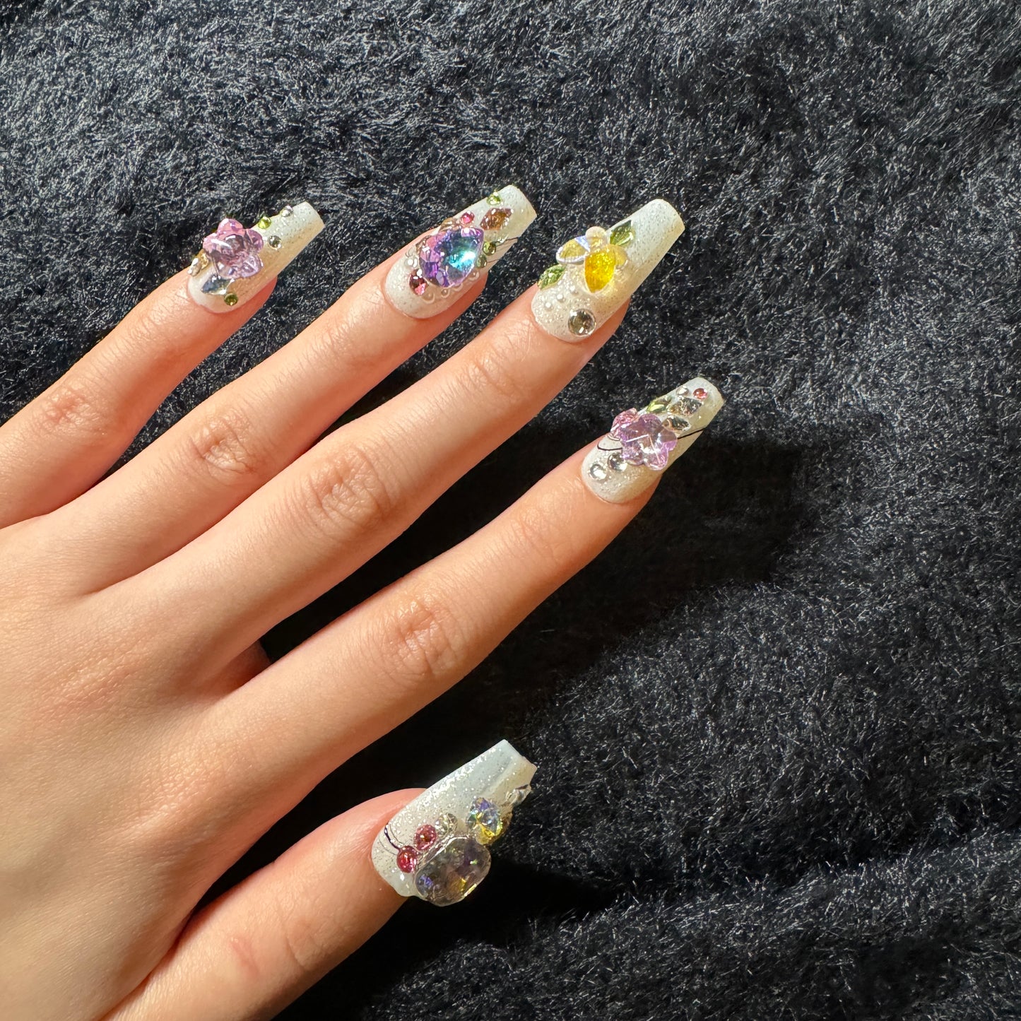 press-on nails / glowy white with colorful stones