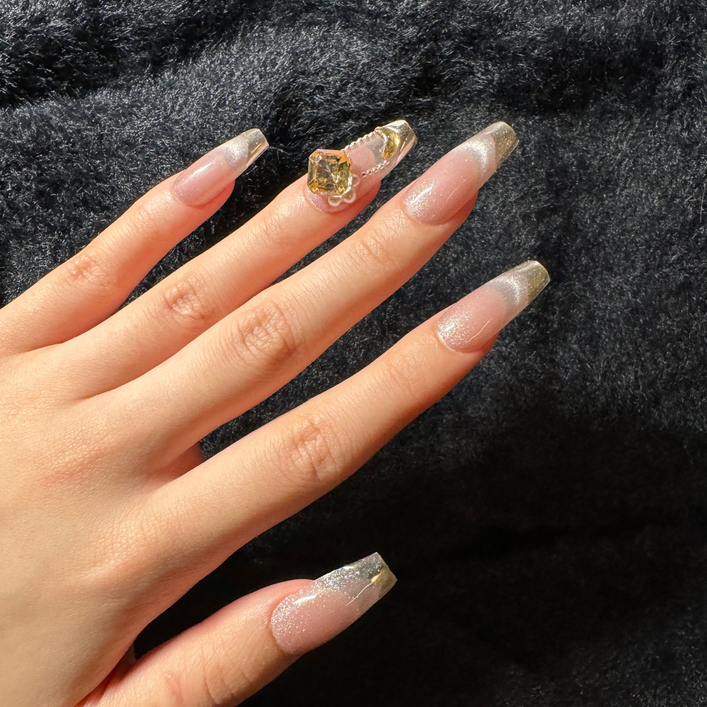 press-on nails / pink cat-eye with French golden tip and stones