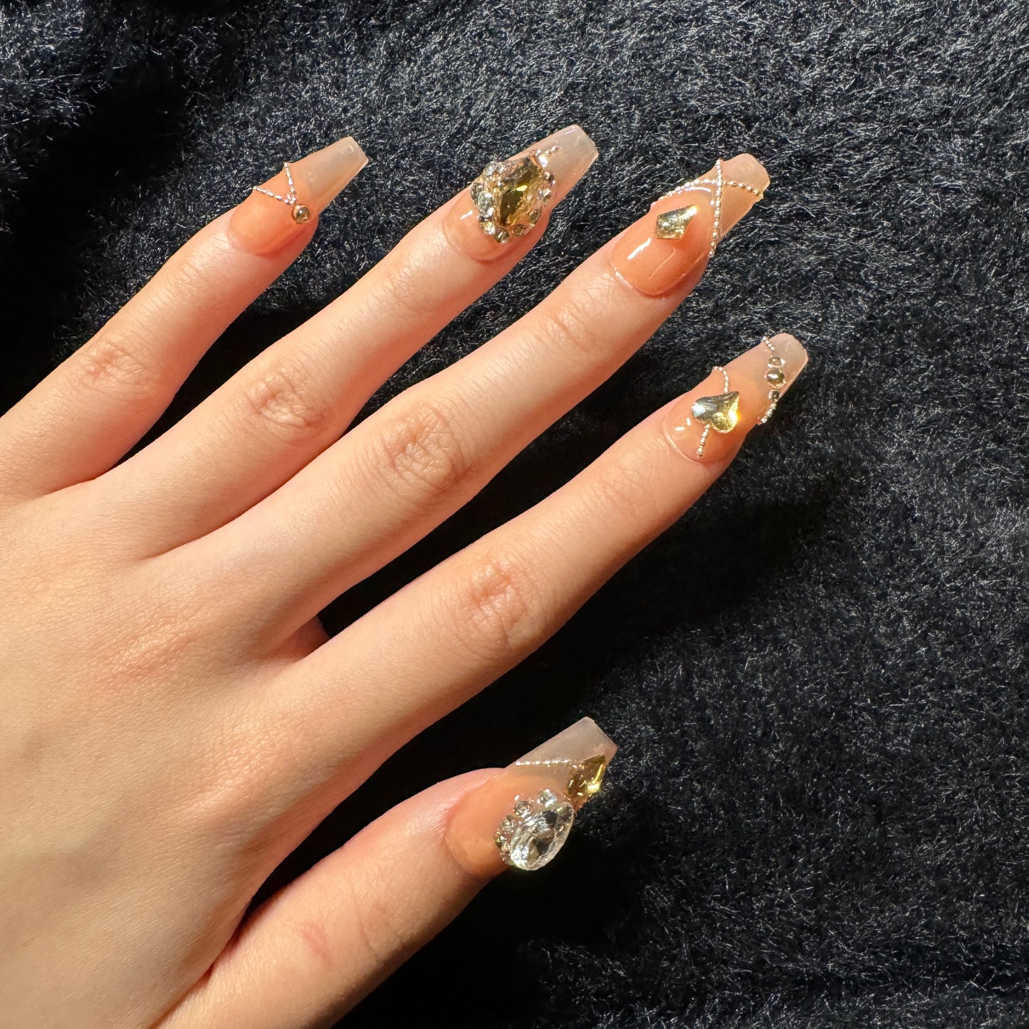 press-on nails / orange pink with stones and chains