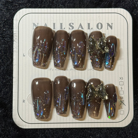 press-on nails / brown grey with butterfly and blue purple stones