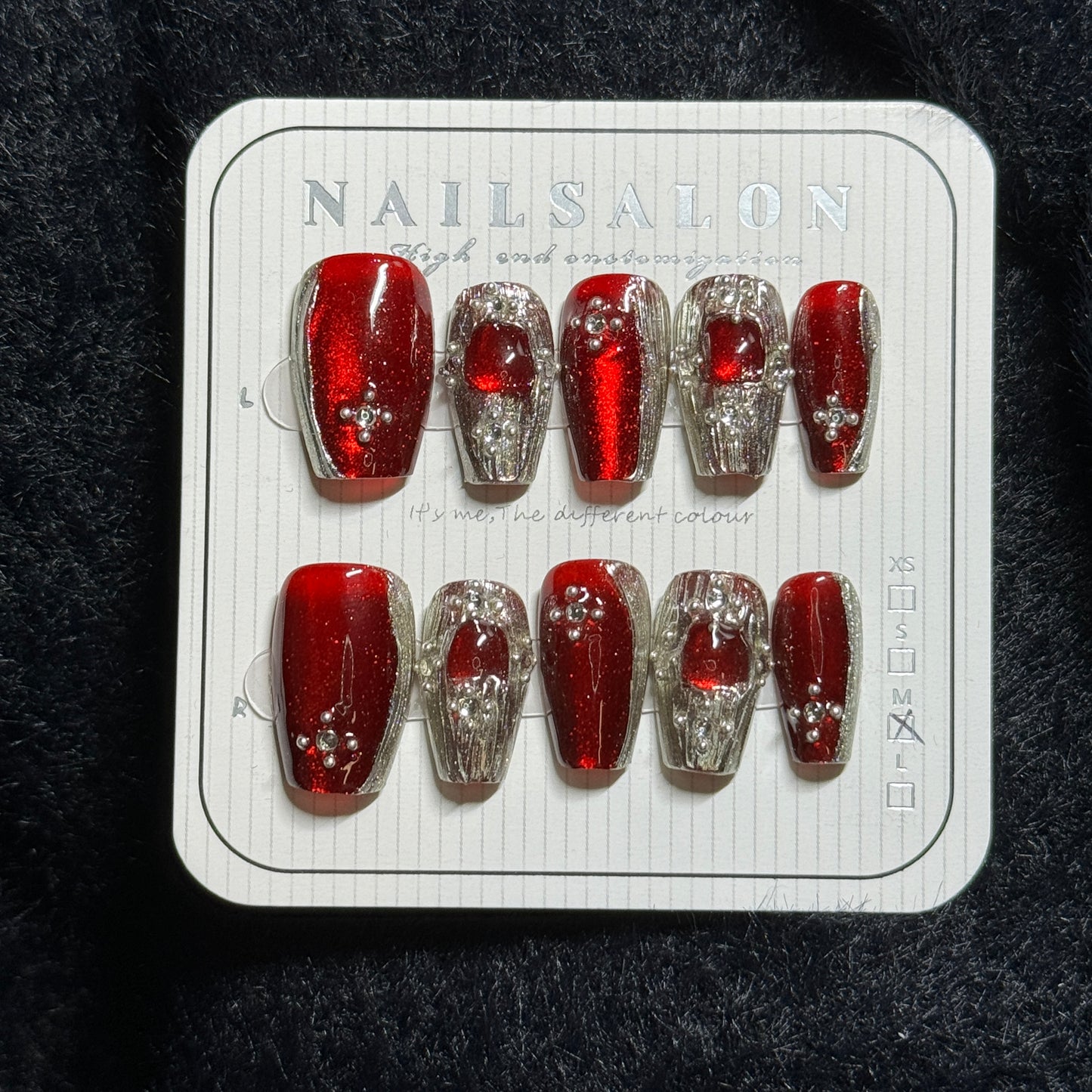 press-on nails / red Buccellati cat-eye